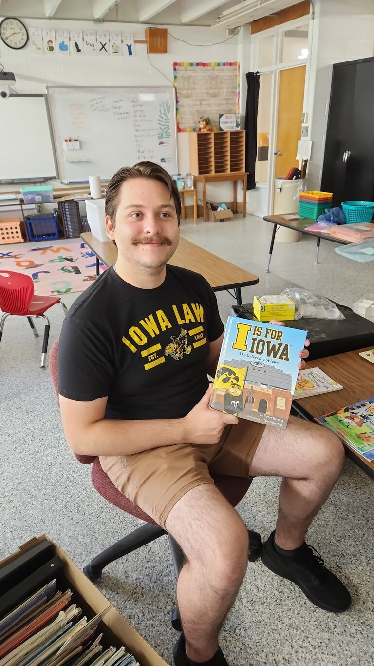 Ben helping Hailey set up her first classroom.