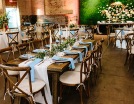 The tables are set with boho-chic decor in the event space at The Eastern.