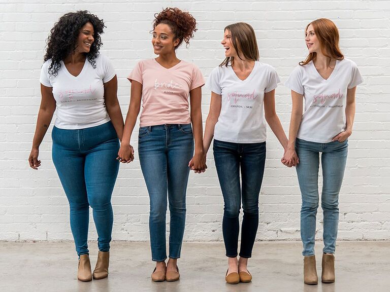 White bridesmaid shirts with pink Squad text and pink shirt with white Bride text