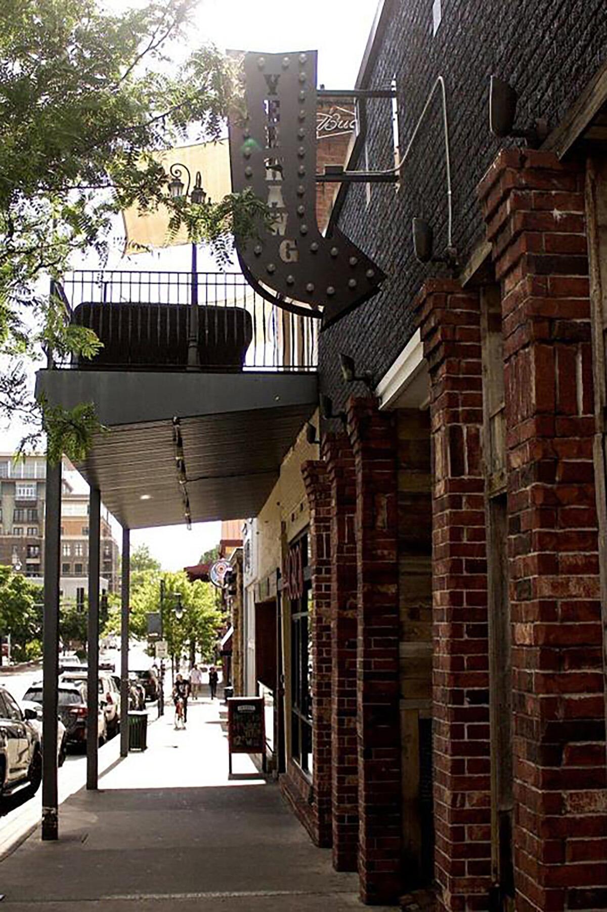 JP and Faith’s story began at none other than Fayetteville’s iconic bar—YeeHawg!