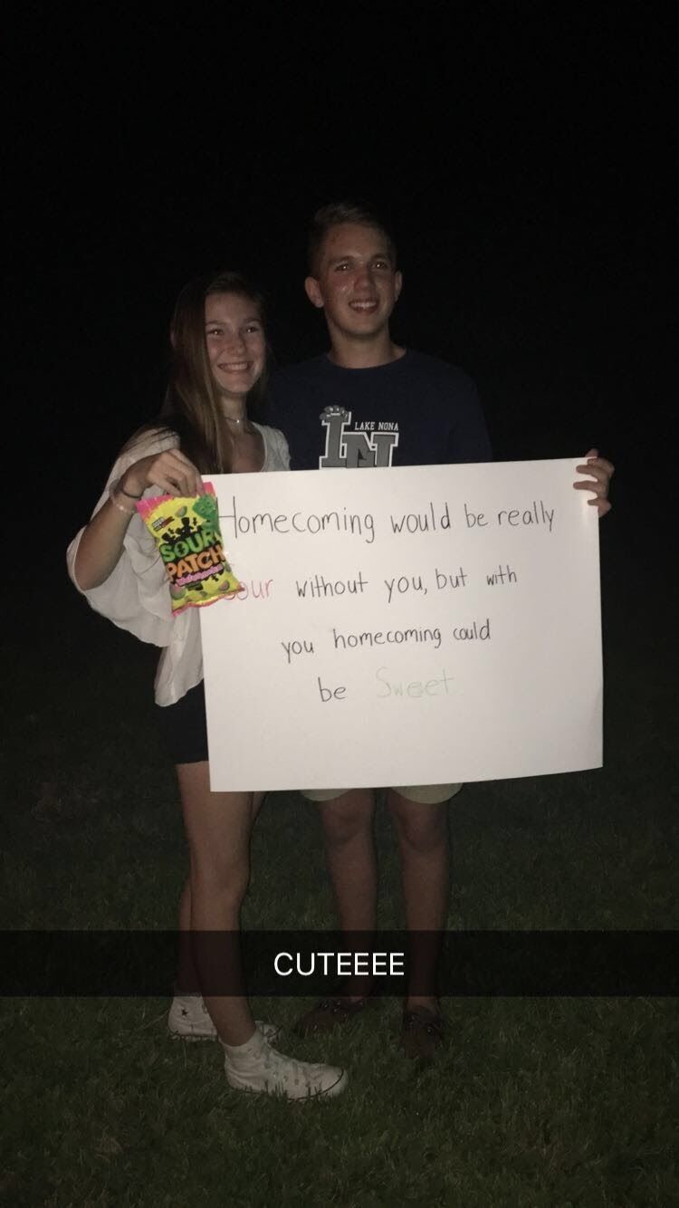 Homecoming  proposal for the first time after a football game!