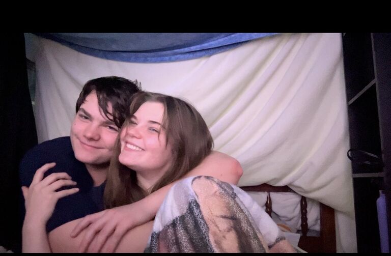 We built an indoor fort together to watch movies in (don't be fooled by the cute picture, the groom tackled the bride five seconds later)