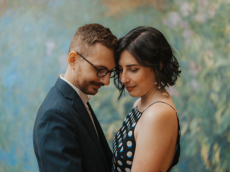 Bride in polka-dot dress and groom in suit