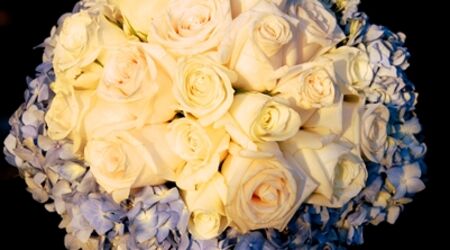 Blue and White Garden Centerpiece featuring hydrangea and roses by  Carithers Flowers Atlanta