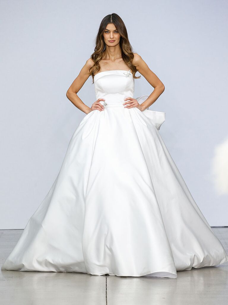 plunging pleated satin ball gown with bow