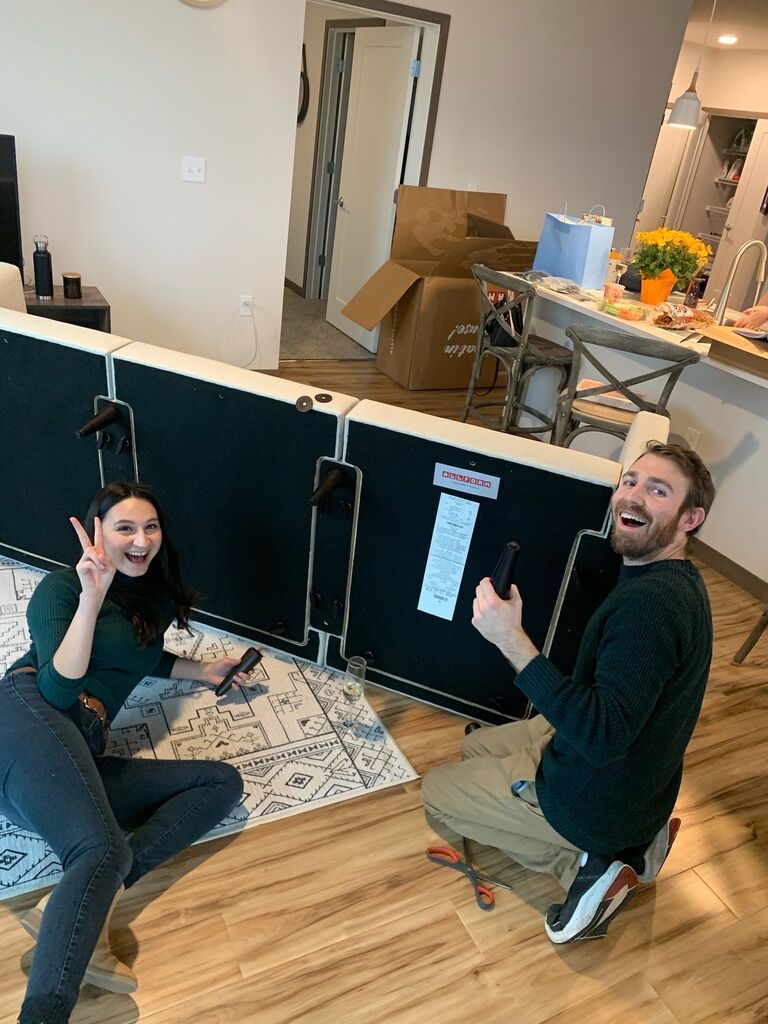 All moved in! Working hard to put together a couch that we eventually sent back. 