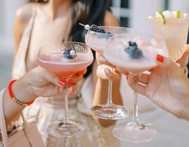 Women cheersing bridal shower cocktails