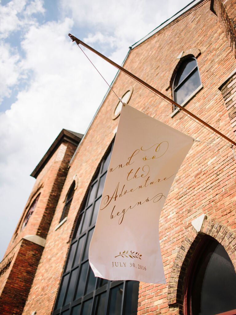 wedding sign quotes banner outside building