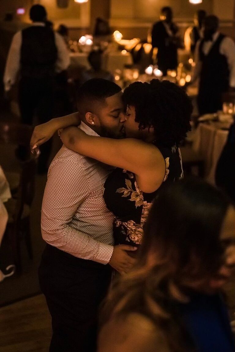 J+M share an intimate dance at a friend's wedding.
