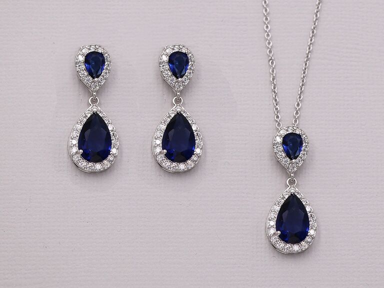 A set of teardrop sapphire and diamond earrings and necklace from Etsy