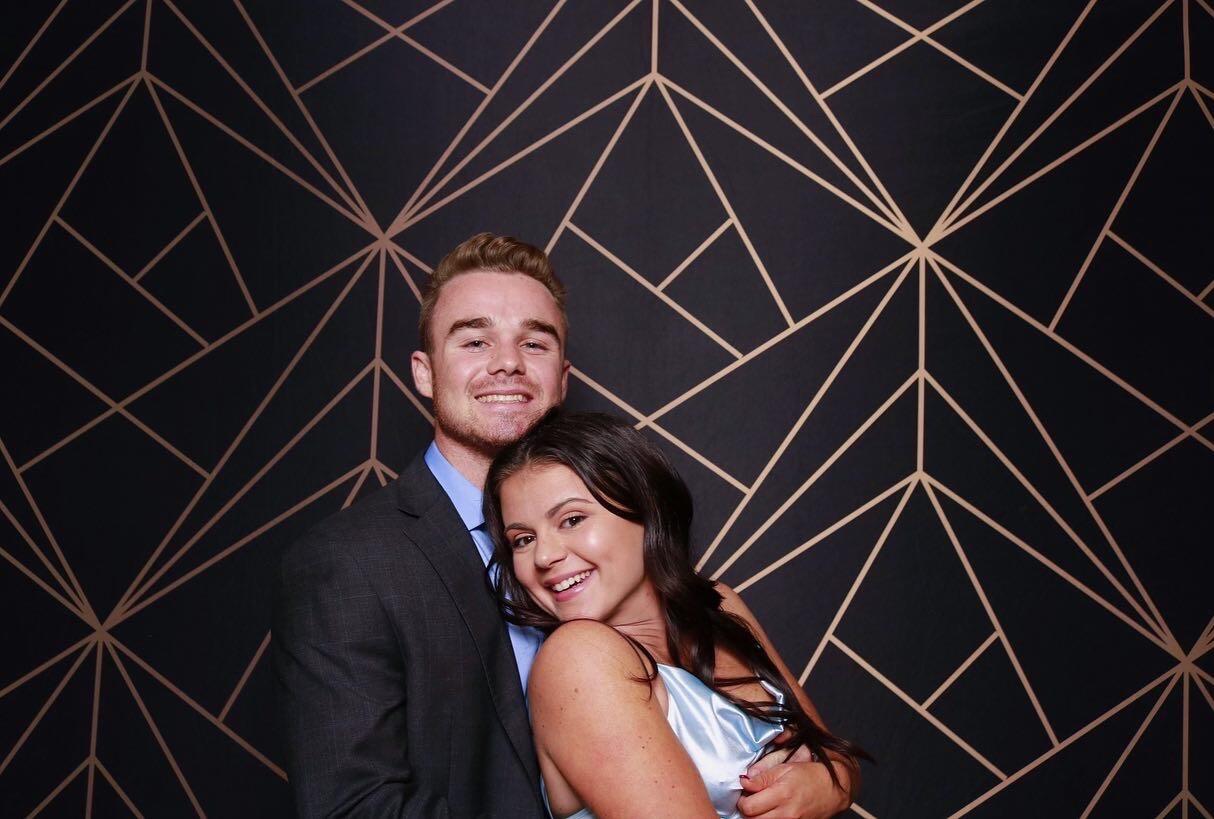 Connor and Olivia spent their first fall semester together at UF making memories with Gators football, hockey games, and Greek-life events. This photo was taken at Olivia’s sorority semi-formal—just a few days before they said “I love you” for the first time (Olivia said it first!).