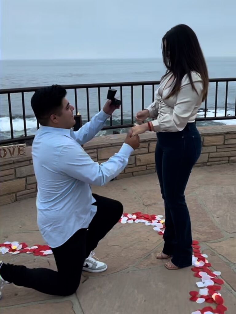he kneels down and pops the question.. Nayeli would you marry me? 