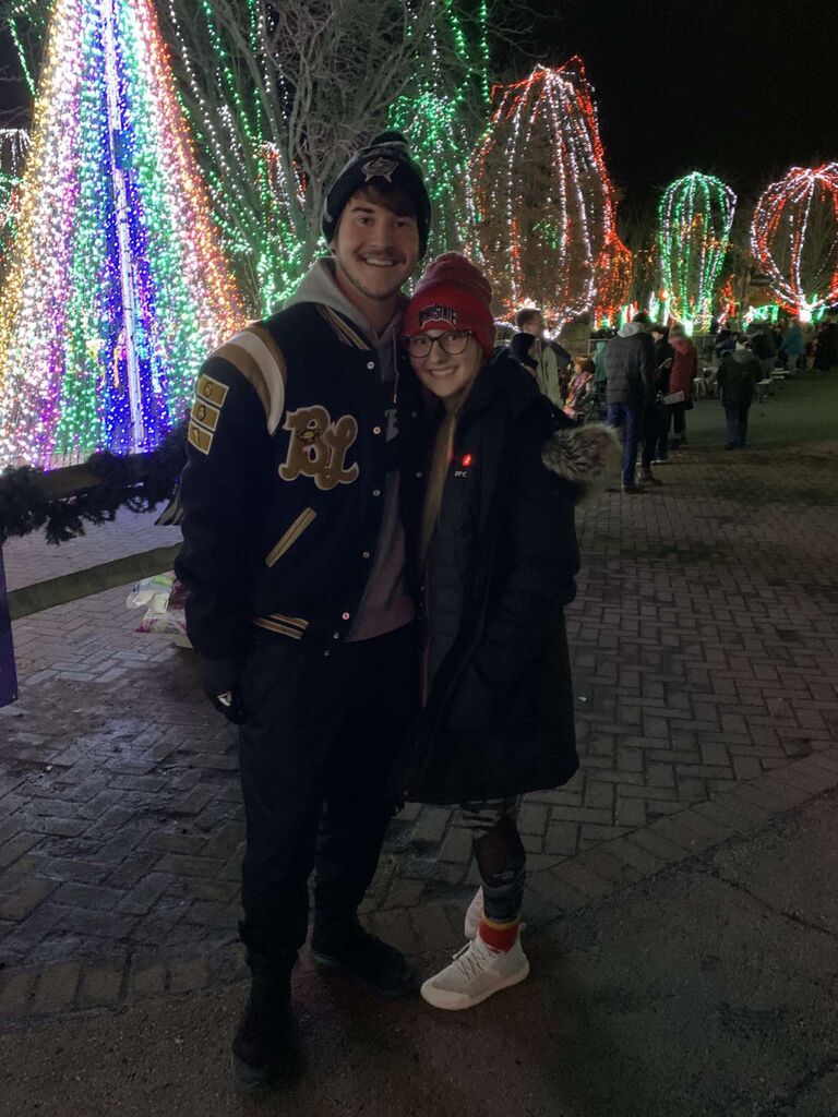 Their first date at the Columbus Zoo to see the zoo lights. This has now become a yearly tradition!