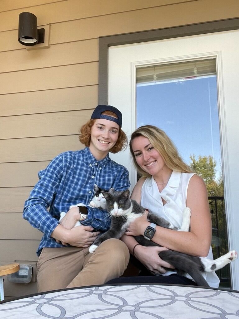 Officially moved in together and adopted our first pet (jet on the left). Benny was not happy at first