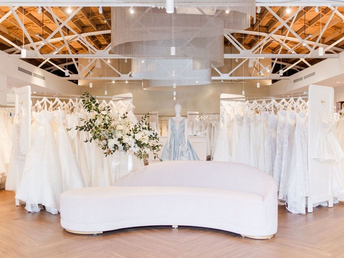 Inside the La Jeune Mariee Bridal Collection salon with rails of dresses