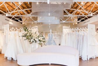 Inside the La Jeune Mariee Bridal Collection salon with rails of dresses