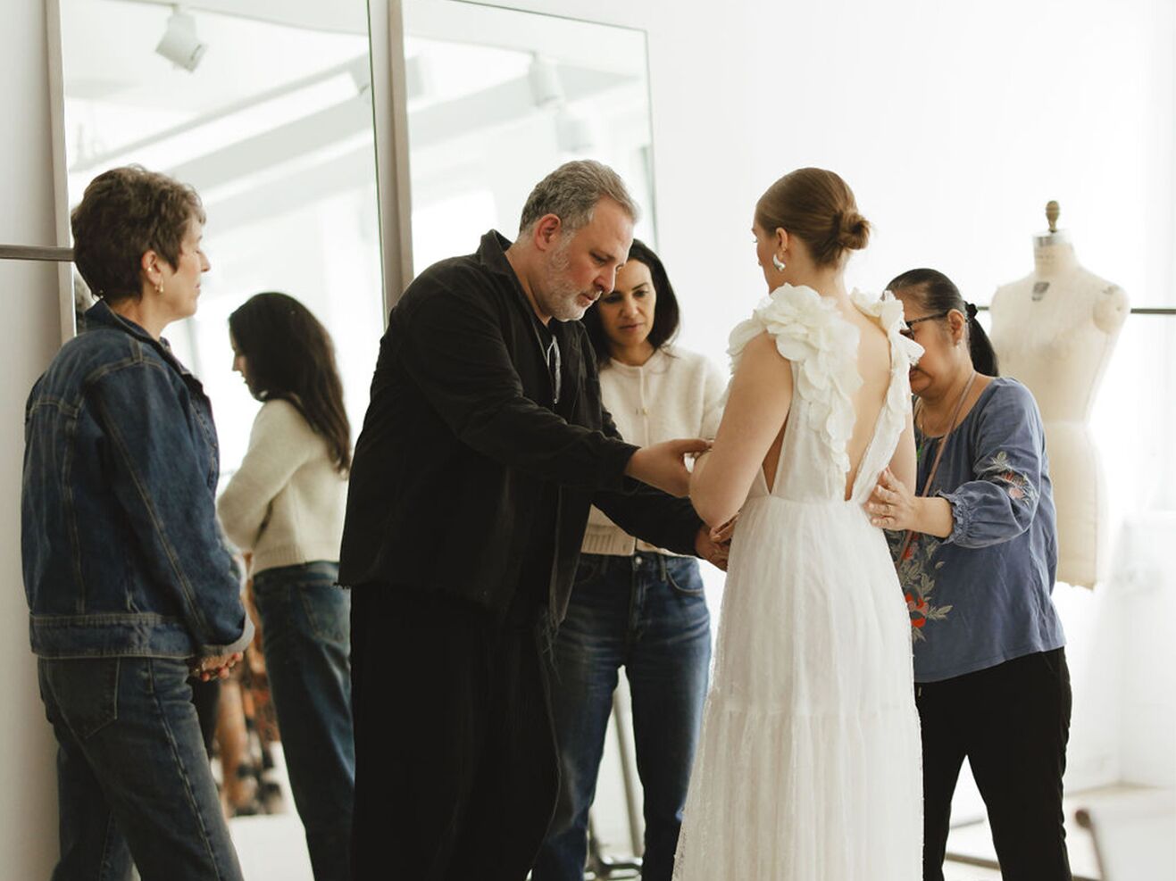 Bride at custom dress fitting