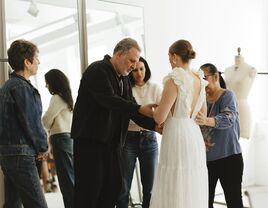 Bride at custom dress fitting