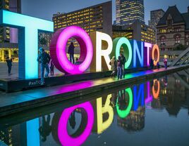 The neon Toronto Sign in Nathan Phillips Square in Canada.