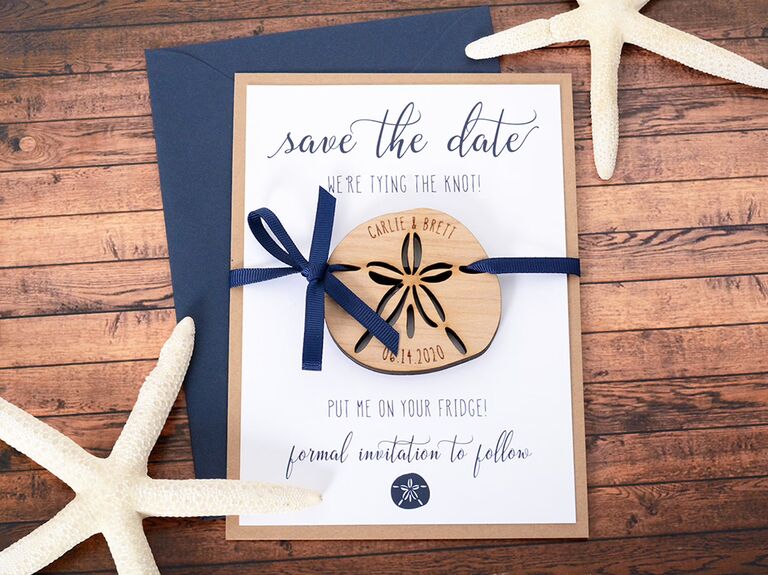 Wooden sand dollar magnet with navy details and playful type