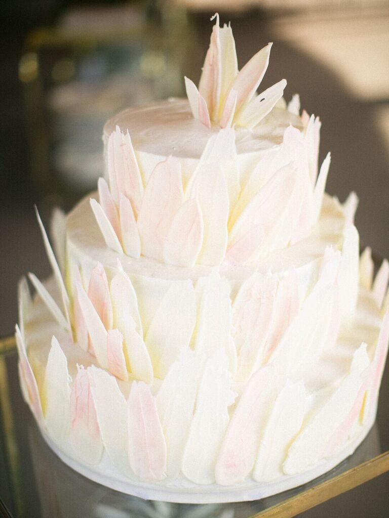 Three-tier modern wedding cake with brush stroke details