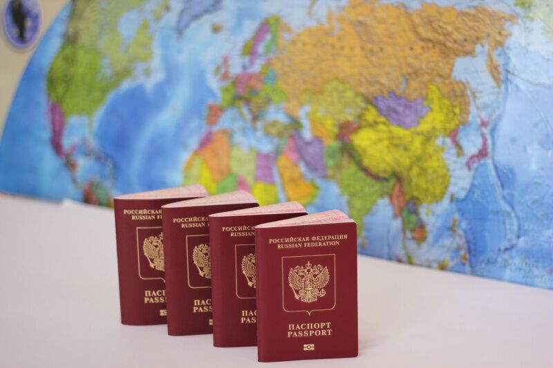 Around the world party theme idea - passport invites