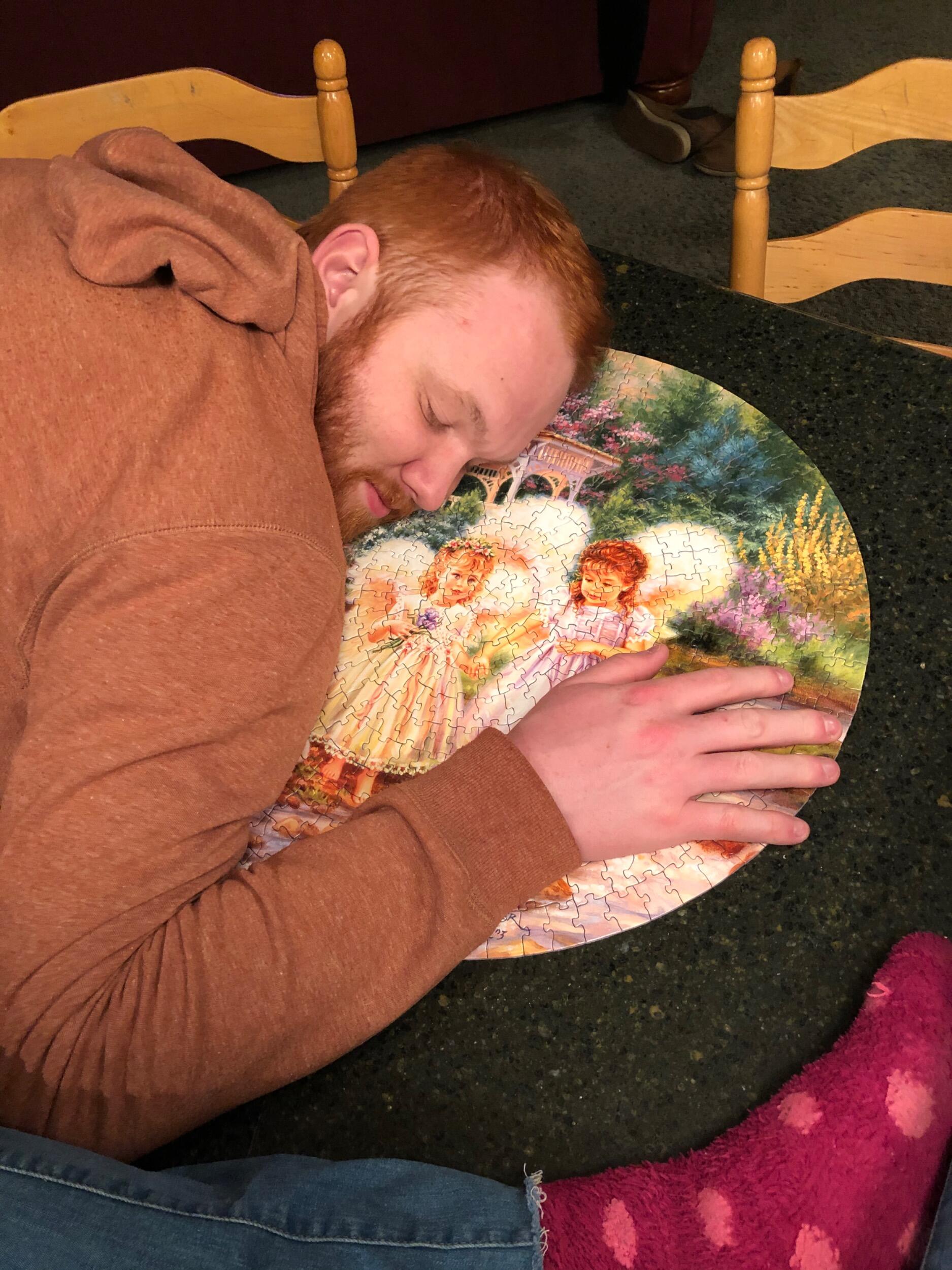 Quarantine boredom sets in. Matisse convinced Aaron to do a puzzle with her - it exhausted him.