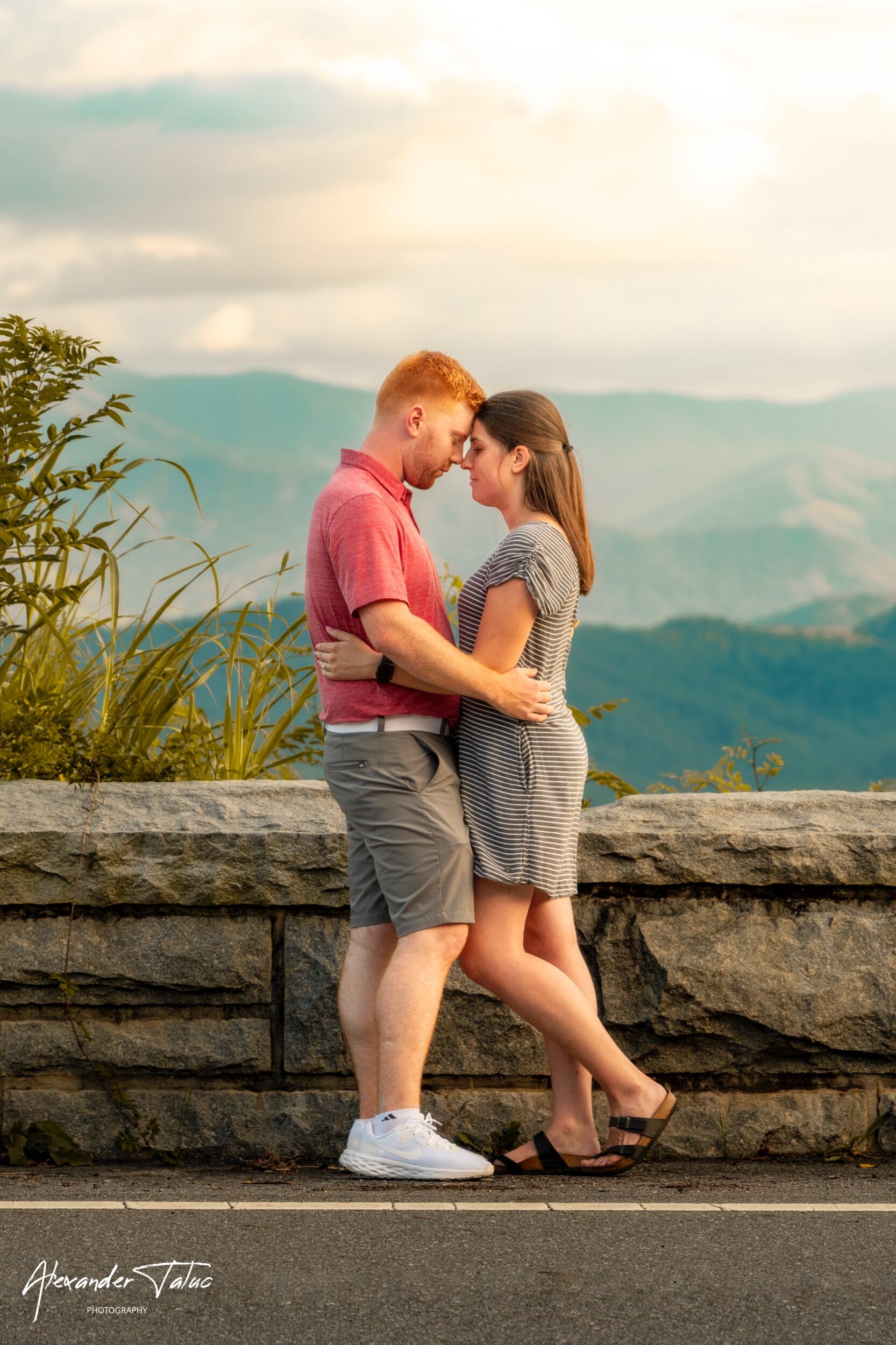 Emery had hired a photographer who hid in the bushes to capture this special moment. We had gone to dinner at the Dancing Bear, and then went to "watch the sunset" over the mountains. Little did Erin know that the sunset would include an engagement and photoshoot!