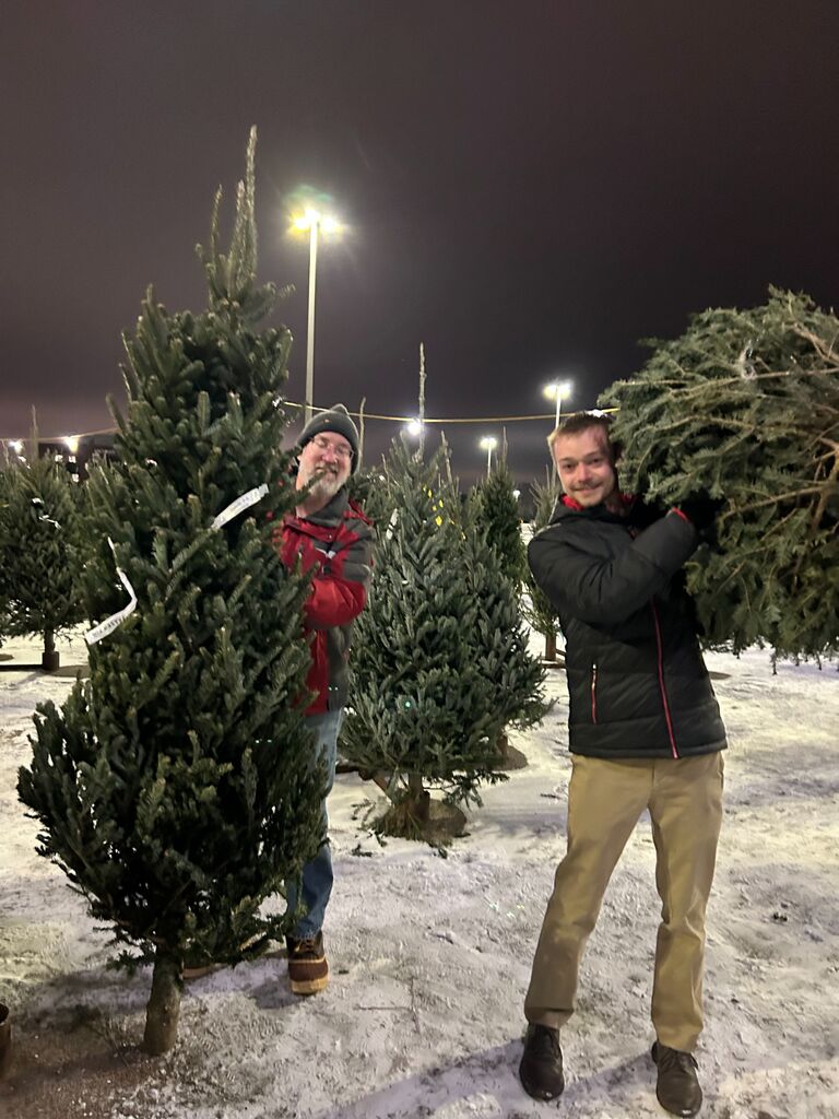 Picking out Christmas trees with Cecilia's dad