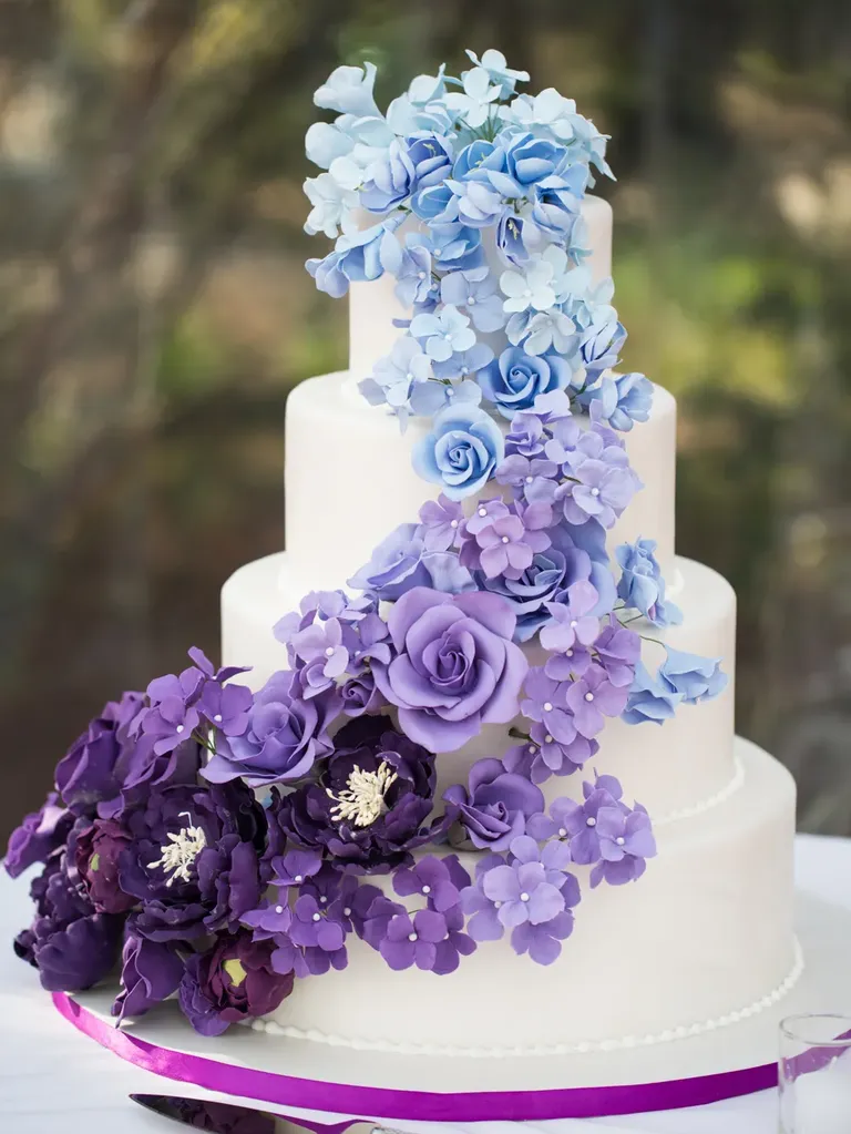 Ombre blue and purple floral four tier wedding cake, taylor swift themed wedding 