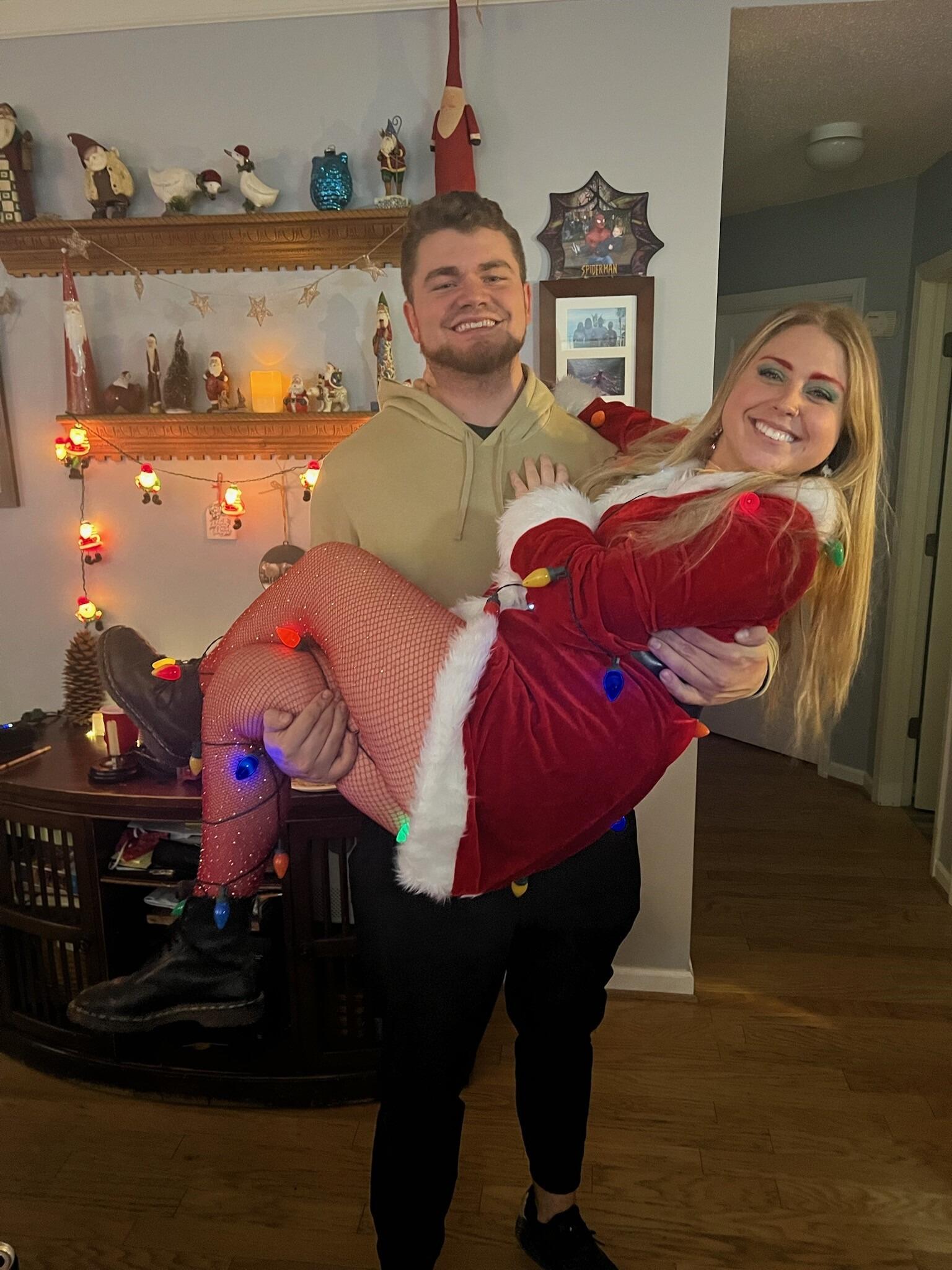 Family & friends Christmas Party. No, Tanner isn't a bah-humbug, he had just finished a shift at work.