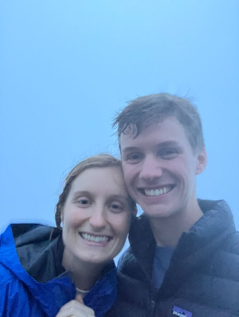 Kaylee and Bill get engaged at the most magical, sunless sunrise on top of Cadillac Mountain in Acadia National Park. Boy was it windy!