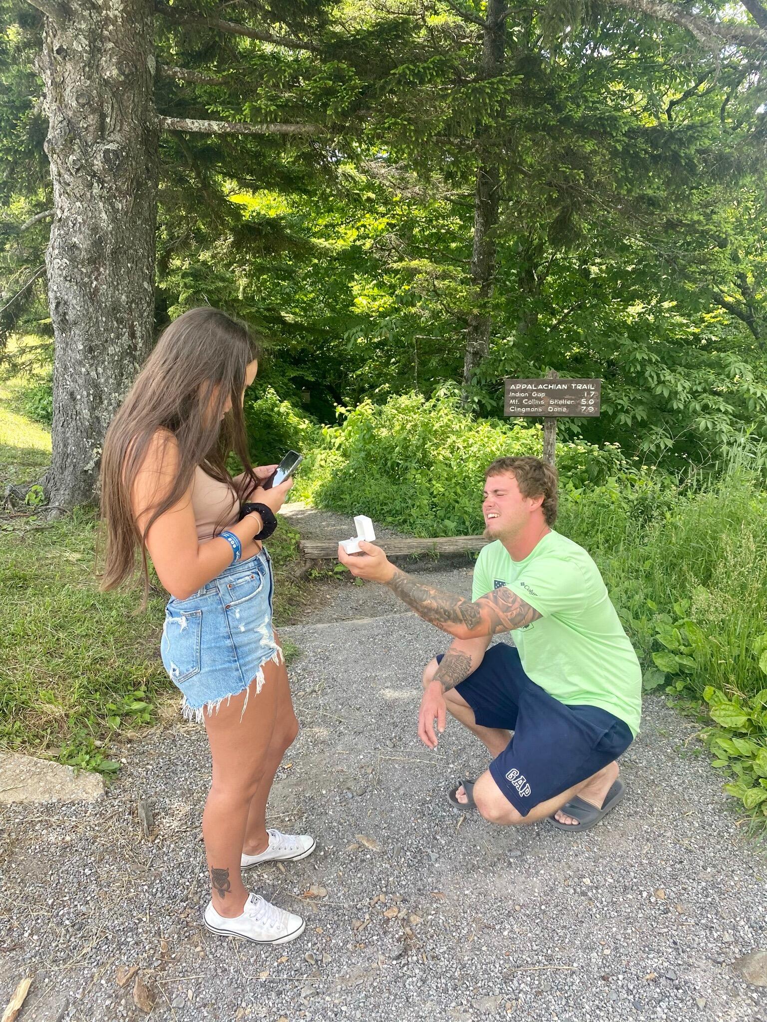 While on a family vacation in Cherokee, North Carolina Matt proposed. 