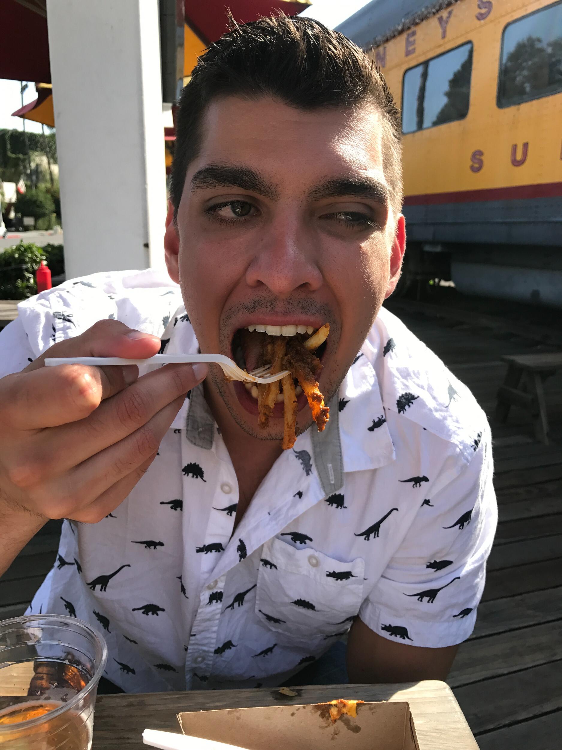 Skyler Eating Chili Cheese Food!