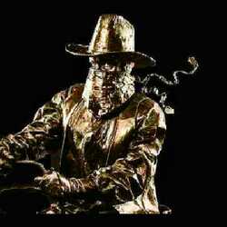Bronze Cowboy living statue, profile image