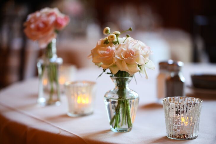 Spray Rose Centerpiece In Bud Vases With Tea Light Candles