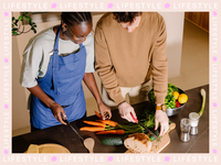 Couple cooking dinner together