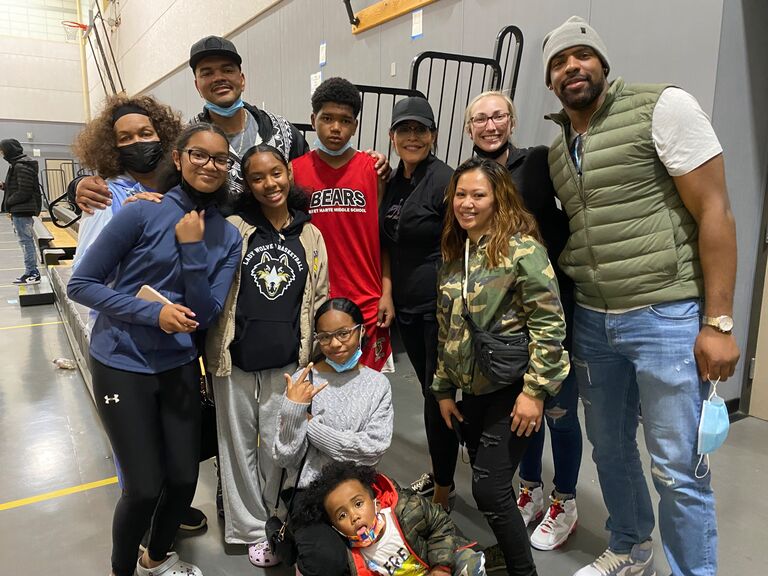 Family rolls deep to support each other! Go Isaiah!
