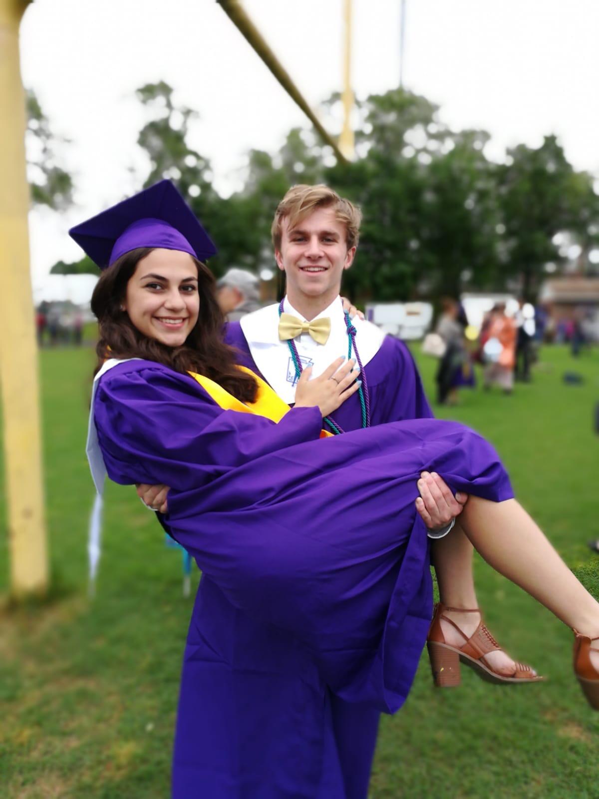 Our last name's are next to each other in the alphabet so we were side-by-side in the yearbook and we also got to sit together at graduation. We have the unique memory of graduating high school one right after the other!