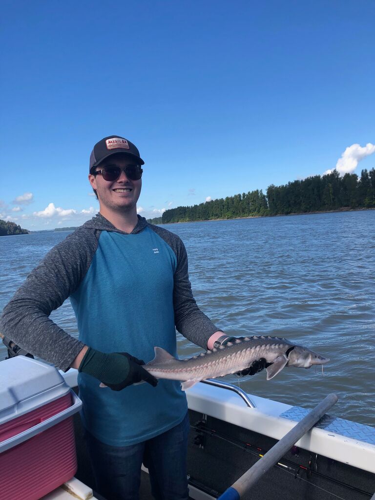 Jared's first sturgeon.