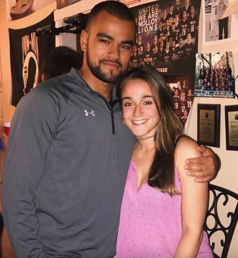 The one time Dani smiled during their four years of long distance in college.