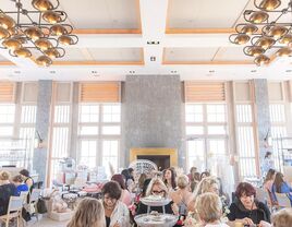 Guests enjoy a chic bridal shower. 