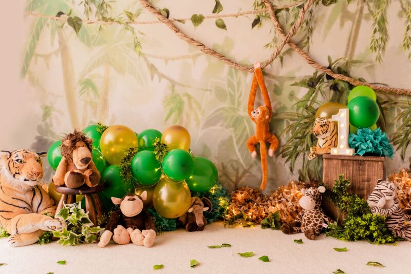 Photo backdrop safari themed birthday party idea