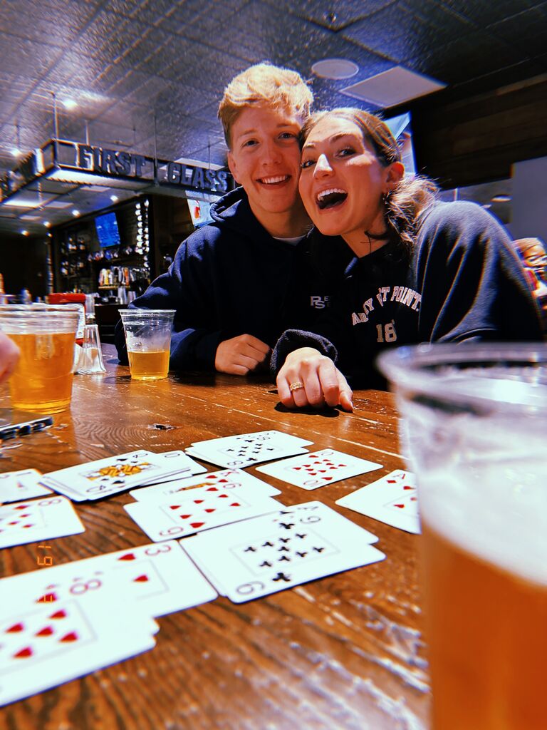 Katie and Mark got through the grind of second semester and enjoyed the company of their friends on the weekends at places like lacrosse tailgates and the "Firstie"- a bar on post.