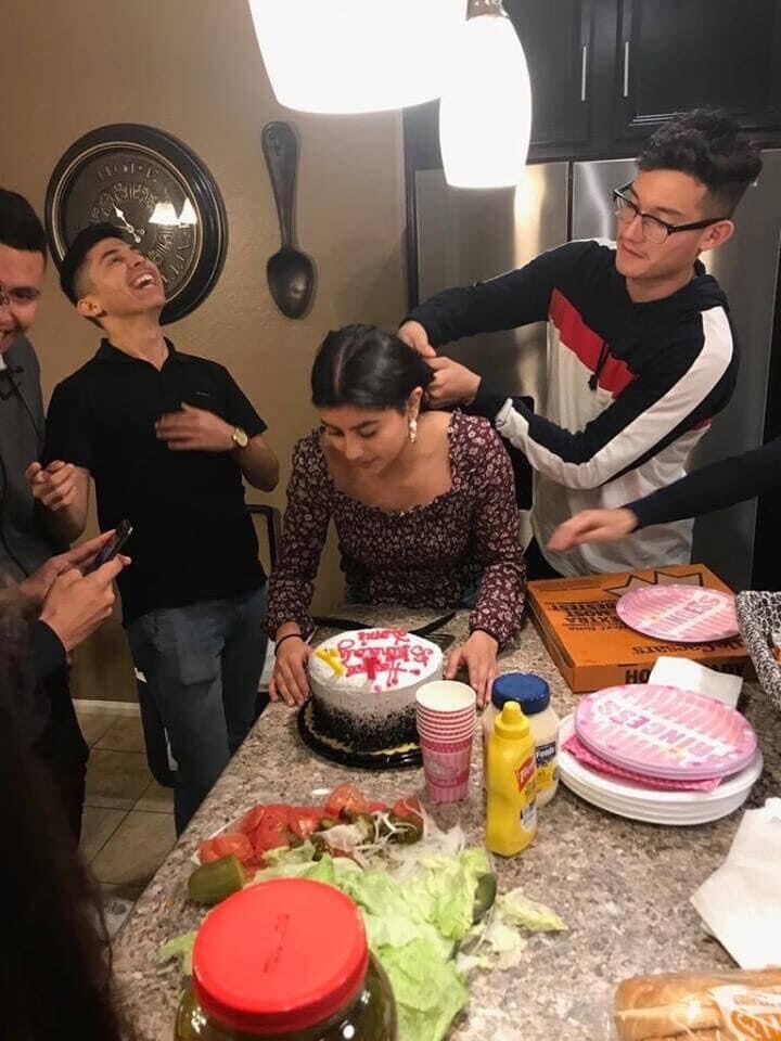 Dominique and Carlos celebrating her 16th birthday; sophomore year of highschool
