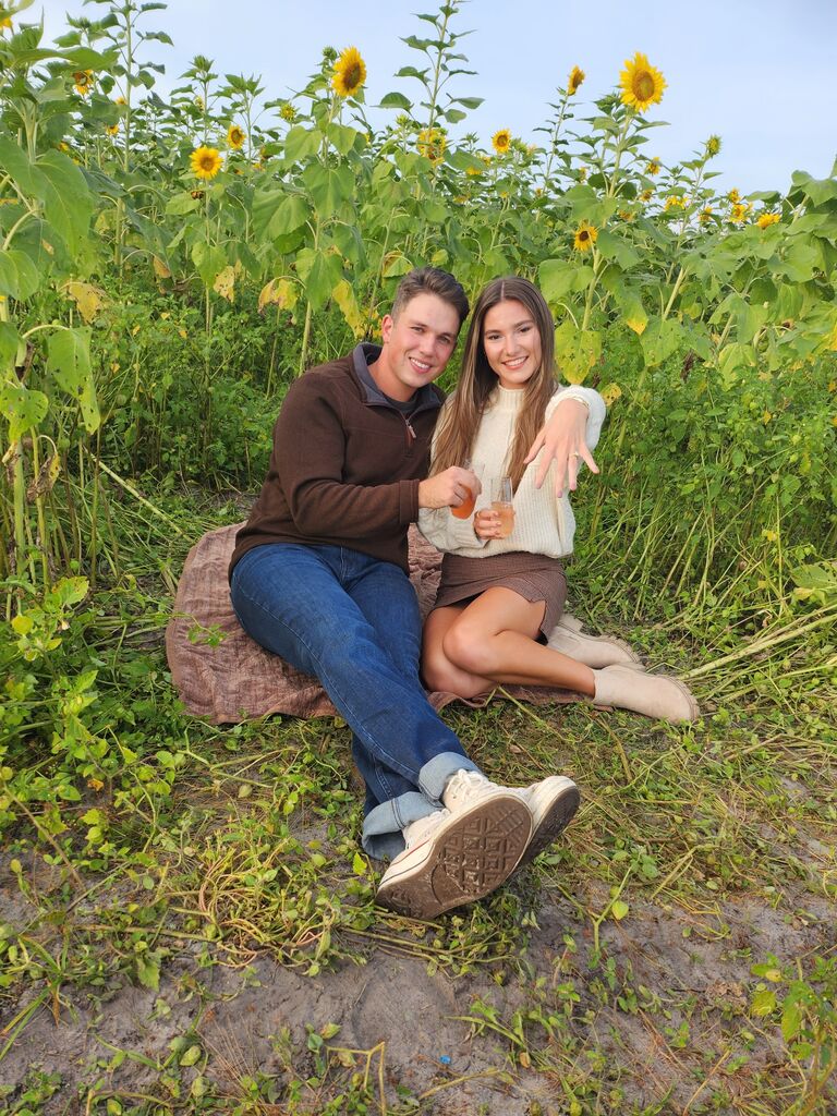 Connor surprised Emily at Mick Farms in St. Cloud 