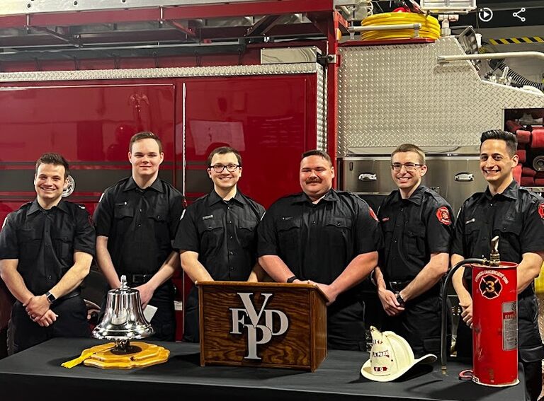 Here, Josh is being sworn in as a probationary firefighter/paramedic with the Villa Park Fire Department. During paramedic school, he had the opportunity to do his ride time with this department and applied after graduation. This milestone marks an exciting step forward in his career and a meaningful move toward building our future together.