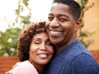 Two parents smiling