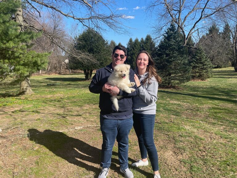 Devon and John bring home their beloved Samoyed, Nittany!