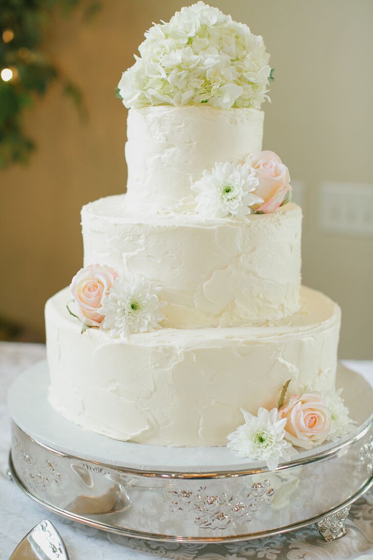 Simple All-White Wedding Cake With Fresh Flowers